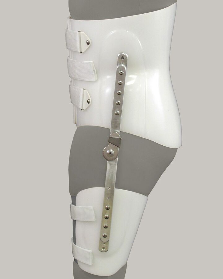 Single opening brace with hip joint and thigh cuff - left lateral view